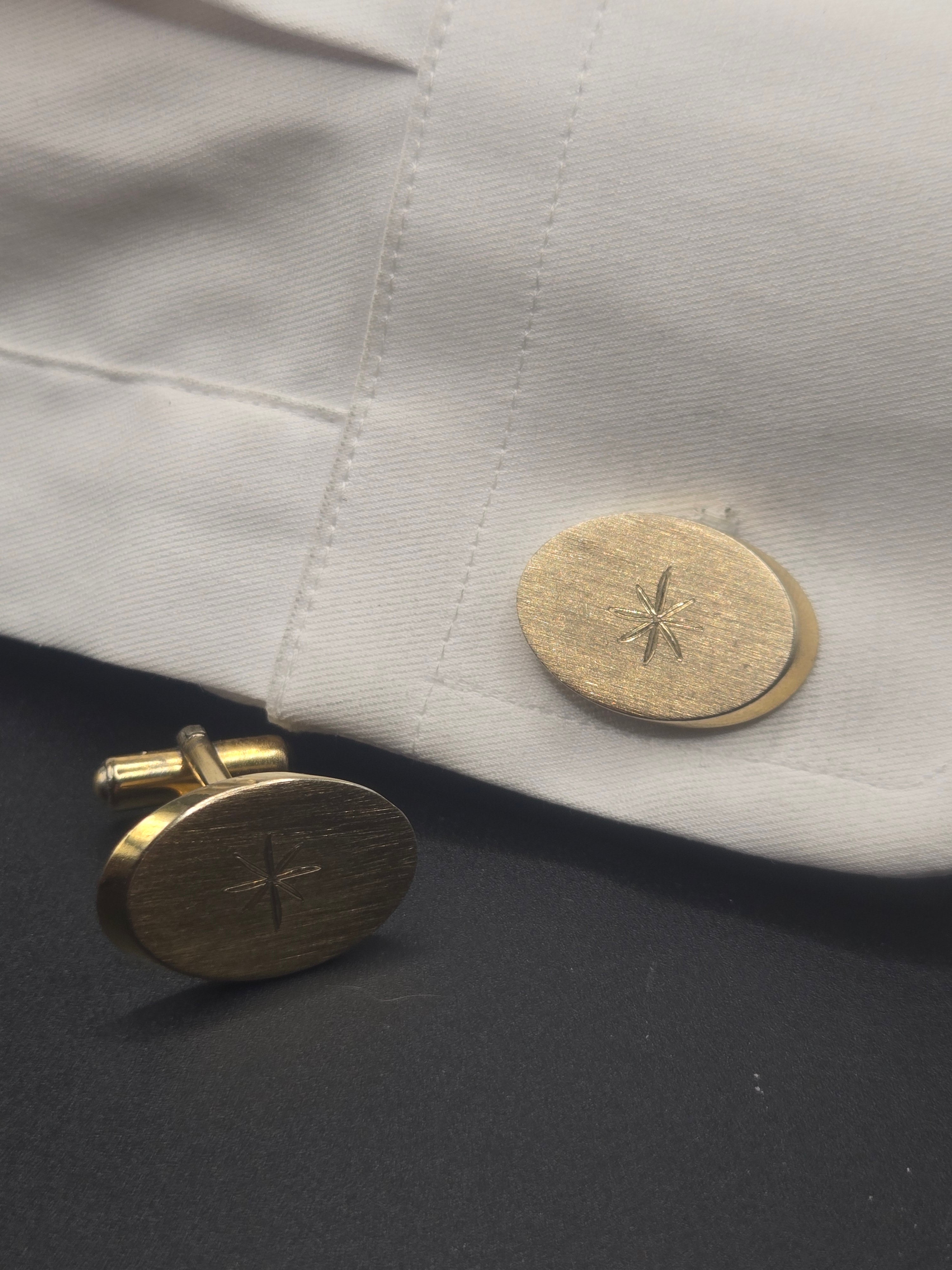 Sophisticated Gold Tone Oval Cufflinks – North Star Engraved Design